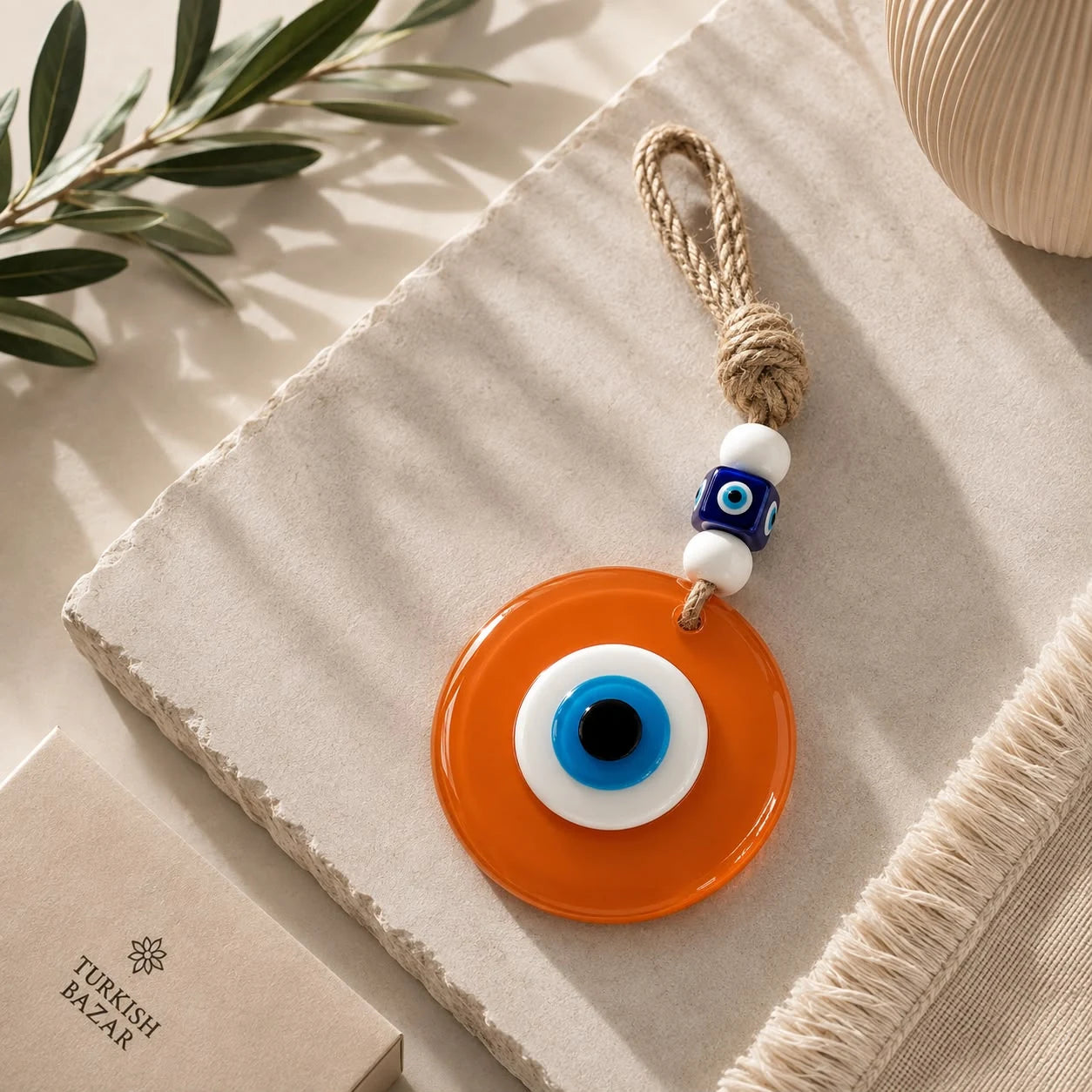 Ojo turco naranja T2; Ojo turco naranja T2 como pieza decorativa de inspiración turca, con detalles visibles en su diseño