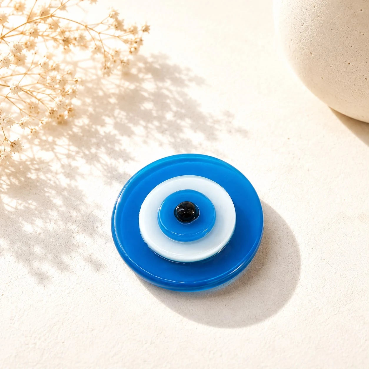 Imán ojo Turquesa; Imán ojo Turquesa con ojo turco visible en una combinación de colores definida por su diseño