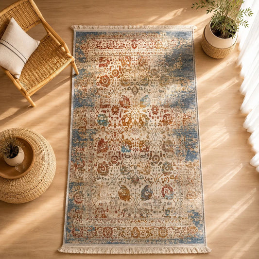 alfombra Aquaclean con diseño floral persa en terracota, dorado y azul
