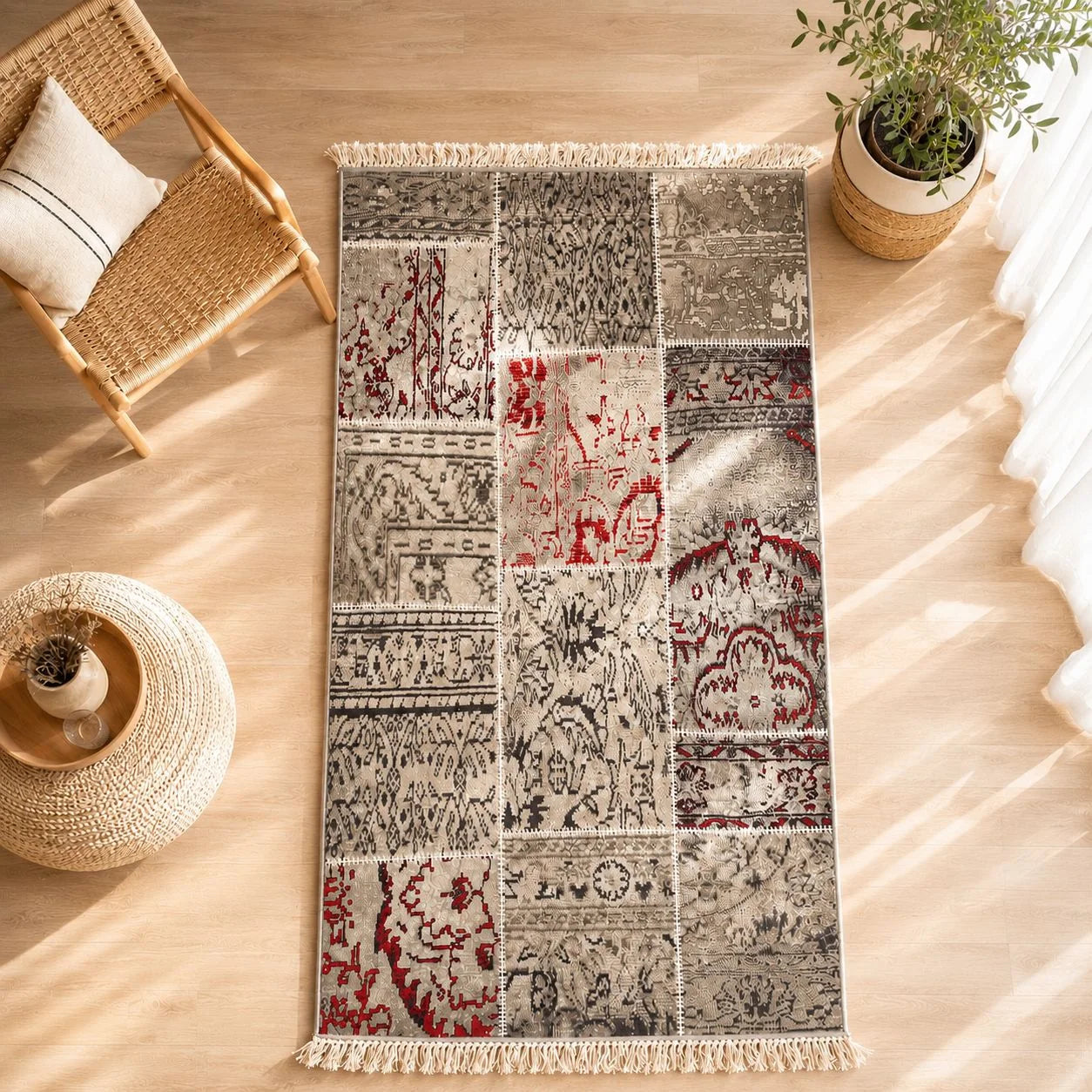 alfombra Aquaclean patchwork en tonos grises y rojos
